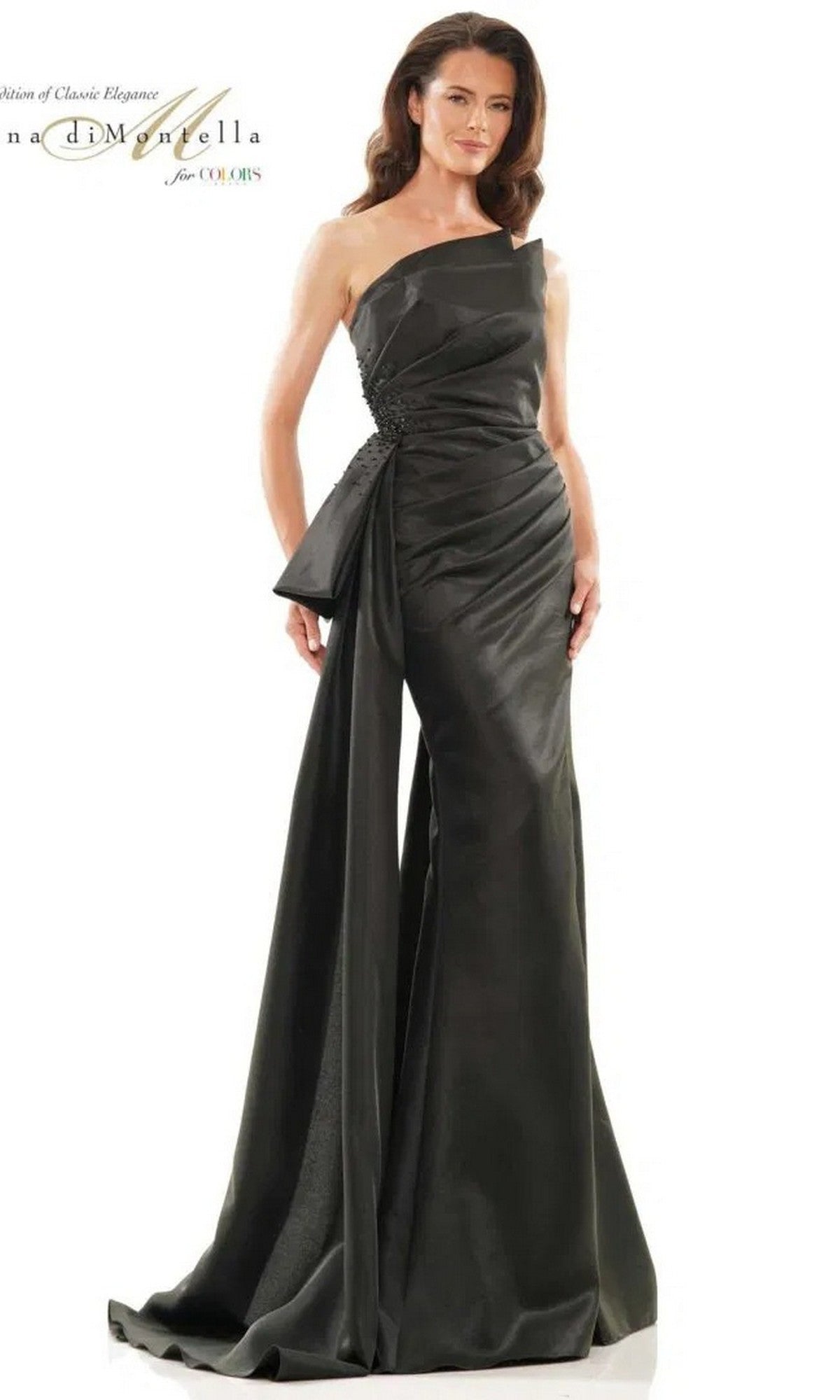 A woman poses against a white background wearing the Rina Di Montella RD2750 long formal dress in black, featuring a strapless sheath silhouette with a side drape and fitted bodice.